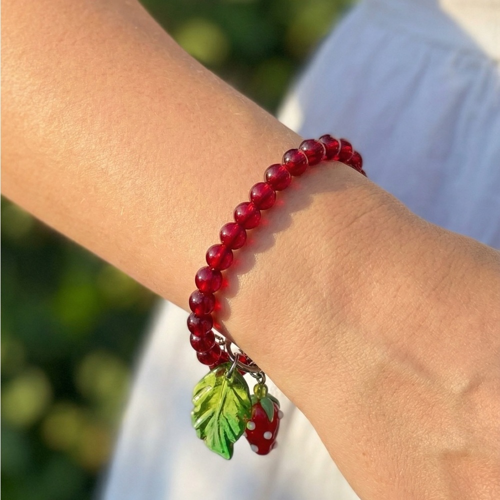 Elegant Red Beaded Bracelet with Leaf Charm